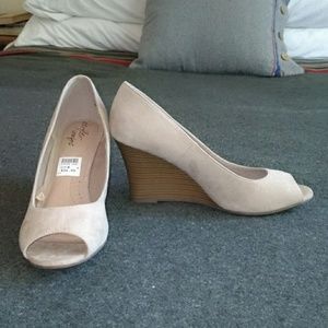 Nude peep-toe wedges